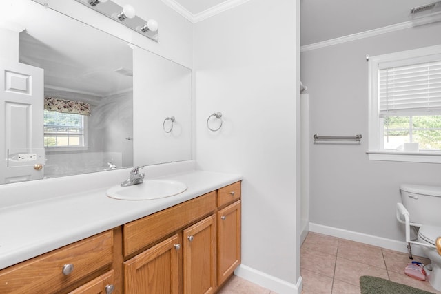 bathroom with ornamental molding, plenty of natural light, tile patterned floors, and vanity