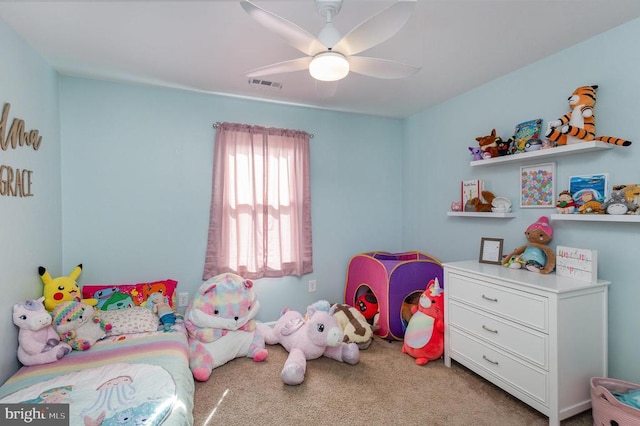 carpeted bedroom featuring ceiling fan