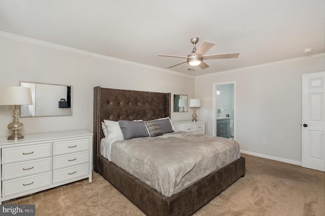 carpeted bedroom featuring connected bathroom, ornamental molding, and ceiling fan