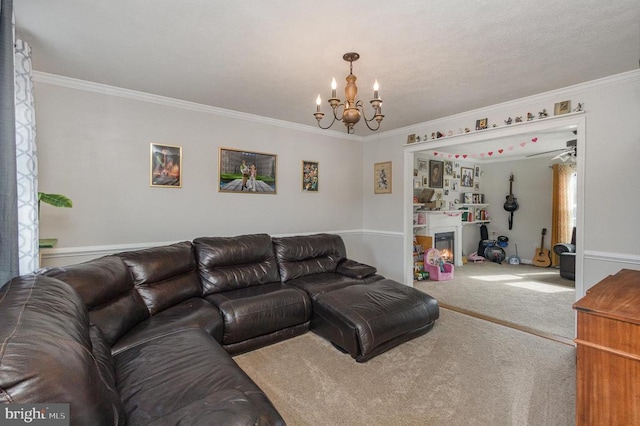 carpeted living room featuring ornamental molding and an inviting chandelier