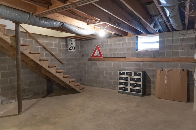 basement featuring stairway