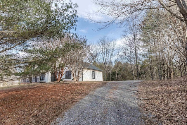 exterior space featuring gravel driveway