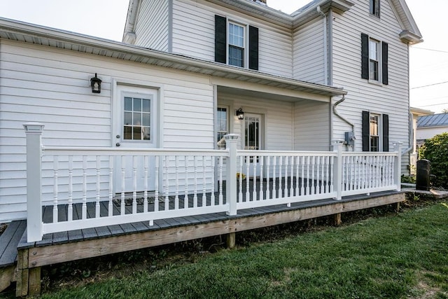 rear view of property with a deck