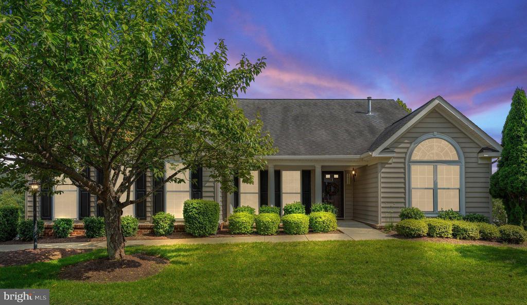 view of front of home with a lawn