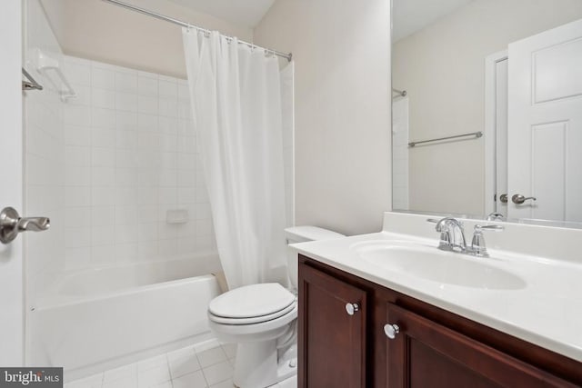 bathroom featuring shower / bath combination with curtain, vanity, tile patterned flooring, and toilet