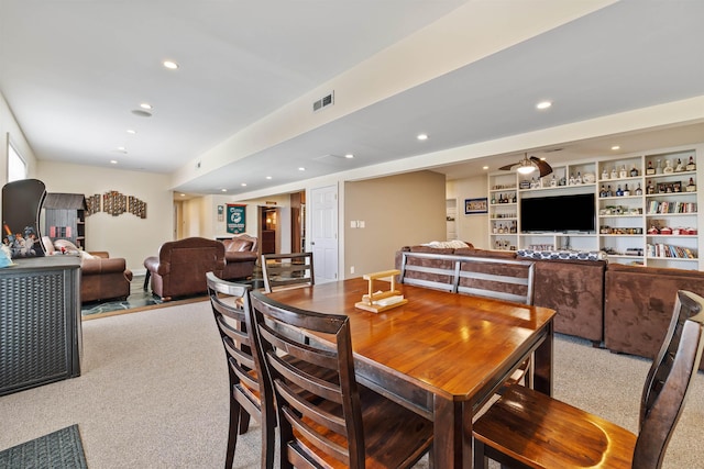 dining area featuring visible vents, recessed lighting, and carpet