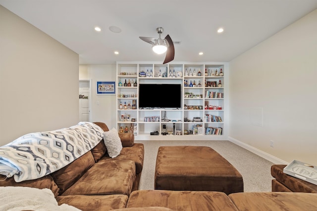 living area with baseboards, a ceiling fan, carpet flooring, and recessed lighting
