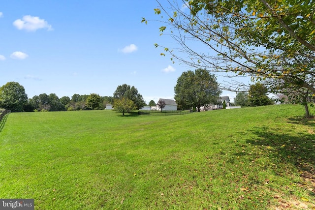 view of yard with fence