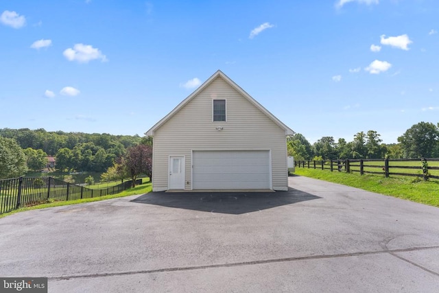 detached garage with fence