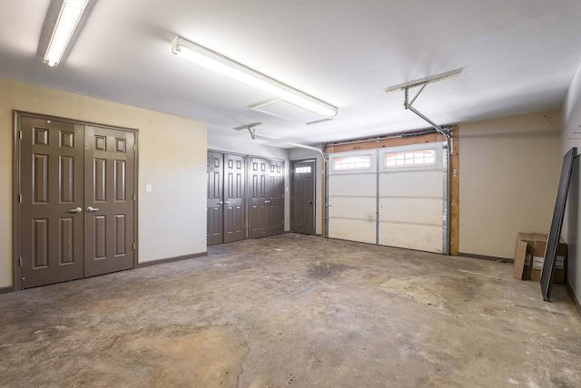 garage featuring baseboards