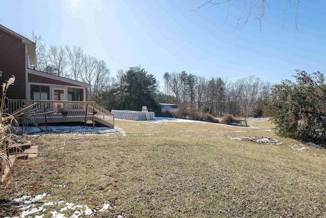 view of yard with a wooden deck