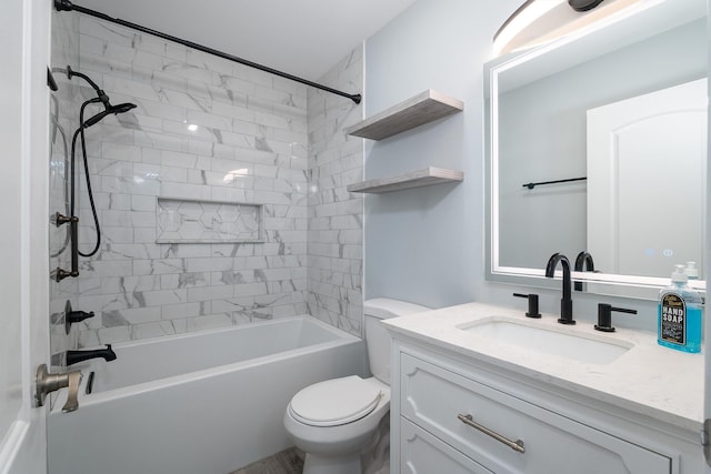 bathroom featuring toilet, shower / bathtub combination, and vanity