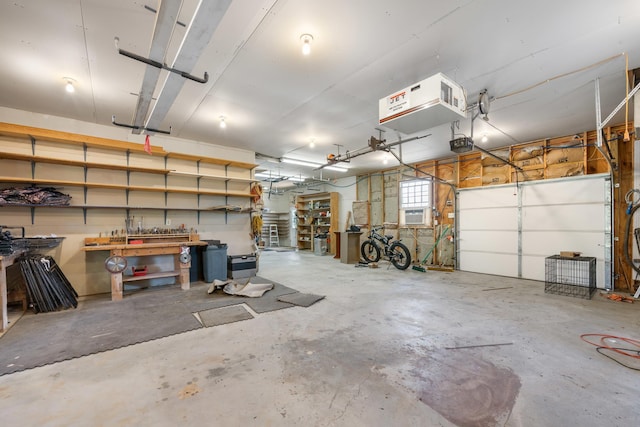 garage featuring a garage door opener and a heating unit