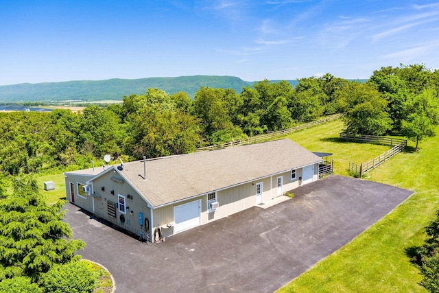 birds eye view of property featuring a rural view