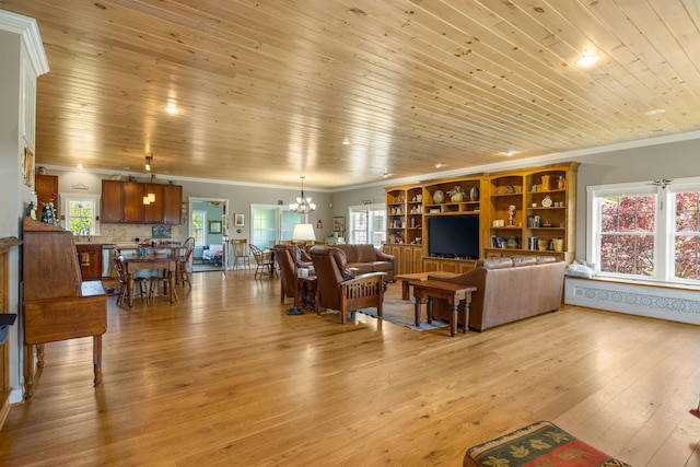 living area featuring a notable chandelier, wood ceiling, ornamental molding, light wood-type flooring, and a wealth of natural light