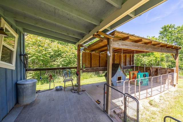 view of patio / terrace with an outbuilding and an exterior structure