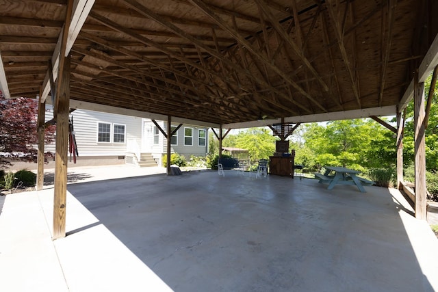 view of patio / terrace featuring entry steps and a carport