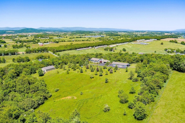 drone / aerial view featuring a rural view and a mountain view