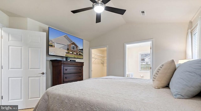 bedroom featuring visible vents, a ceiling fan, and vaulted ceiling