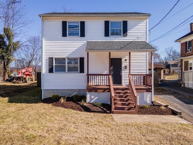 view of front property featuring a front lawn