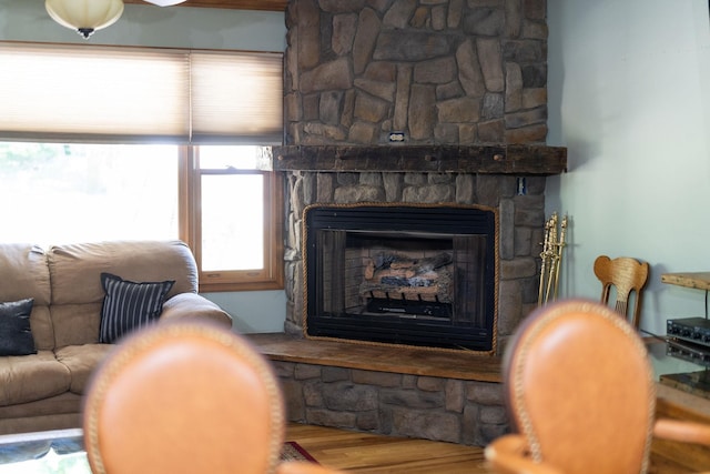 interior space featuring wood-type flooring and a fireplace