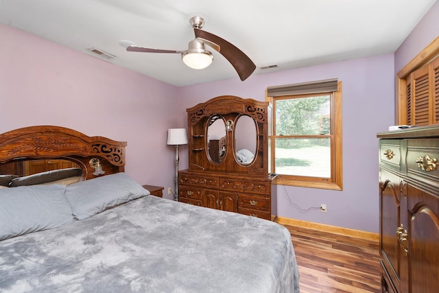 bedroom featuring ceiling fan and light wood-type flooring