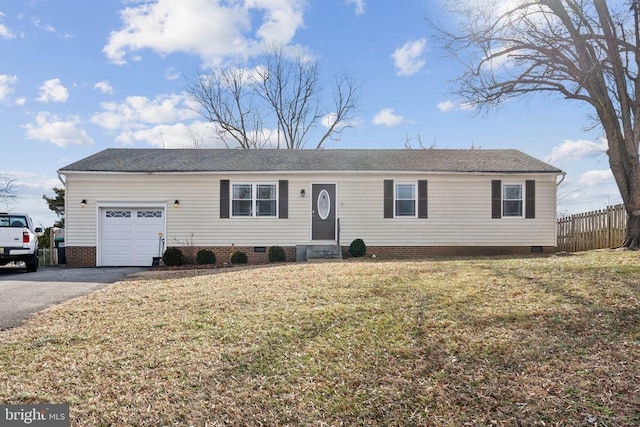 ranch-style home with aphalt driveway, crawl space, an attached garage, fence, and a front yard