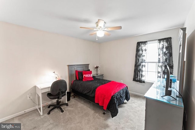 bedroom with carpet, baseboards, and ceiling fan