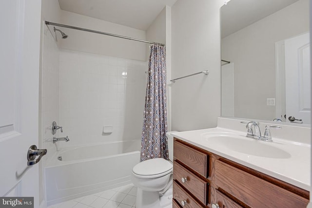 bathroom featuring vanity, tile patterned floors, shower / bath combination with curtain, and toilet