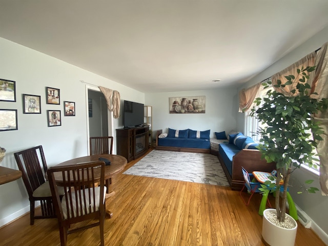 living room with light wood-style floors and baseboards