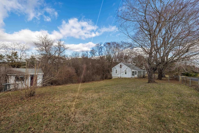 view of yard with fence