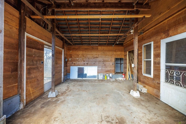 interior space featuring wooden walls