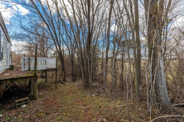 view of yard with a deck