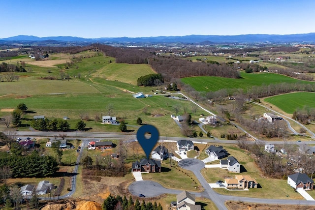 bird's eye view with a residential view and a mountain view