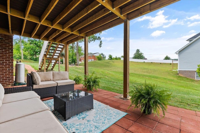 view of patio with stairway and outdoor lounge area