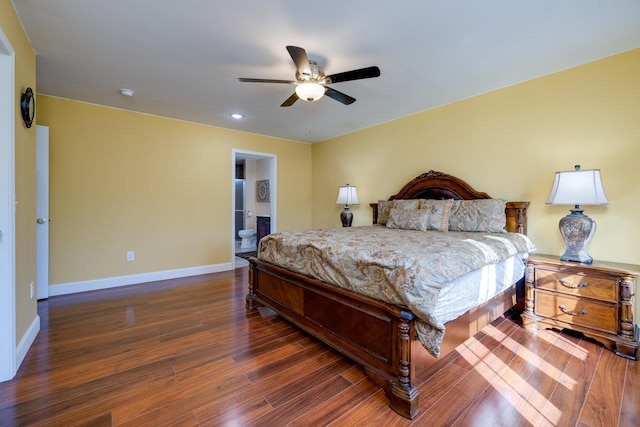 bedroom featuring dark wood finished floors, a ceiling fan, and baseboards