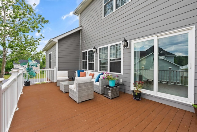 wooden deck with an outdoor hangout area