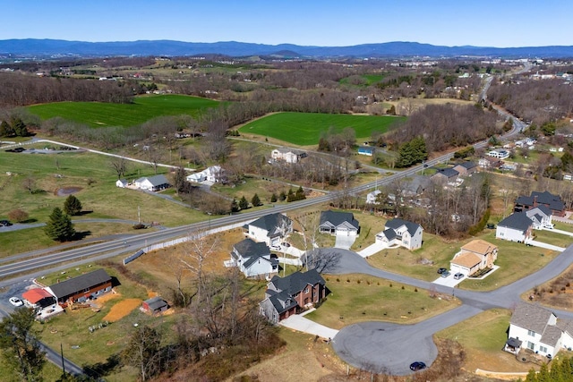 aerial view featuring a residential view and a mountain view