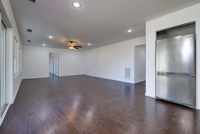 empty room with recessed lighting, dark wood-style flooring, visible vents, and ceiling fan