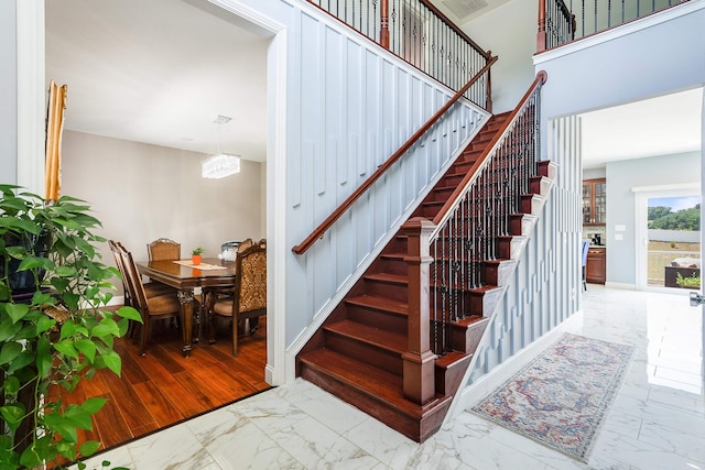 stairway with marble finish floor