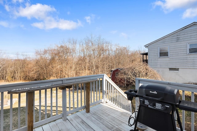 deck featuring a grill