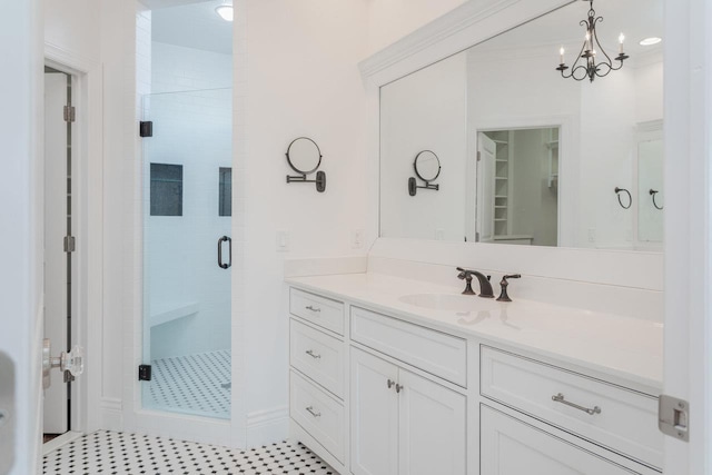 bathroom with vanity and an enclosed shower