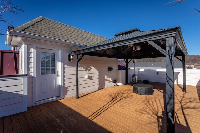 wooden terrace with a gazebo