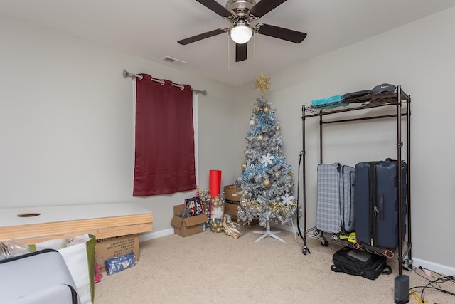 game room with visible vents, a ceiling fan, baseboards, and carpet floors