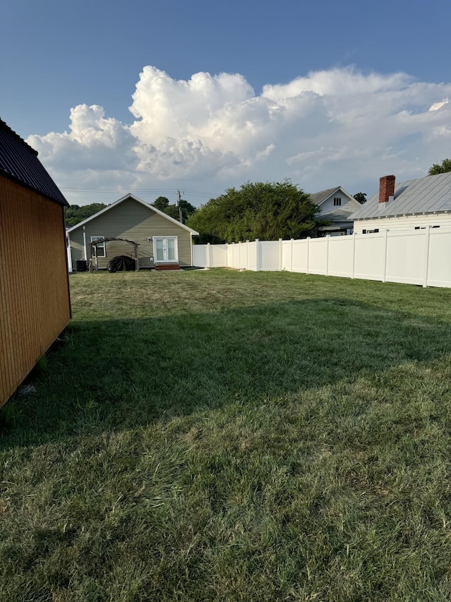 view of yard featuring fence