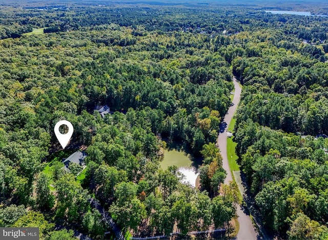 drone / aerial view with a forest view