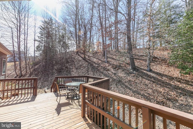 deck featuring outdoor dining space