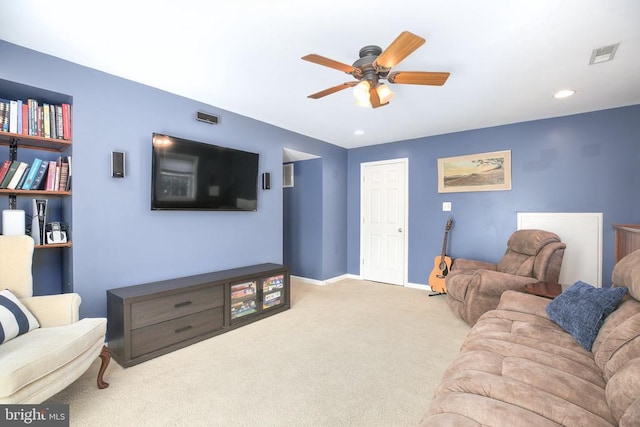 carpeted living room featuring a ceiling fan, recessed lighting, baseboards, and visible vents