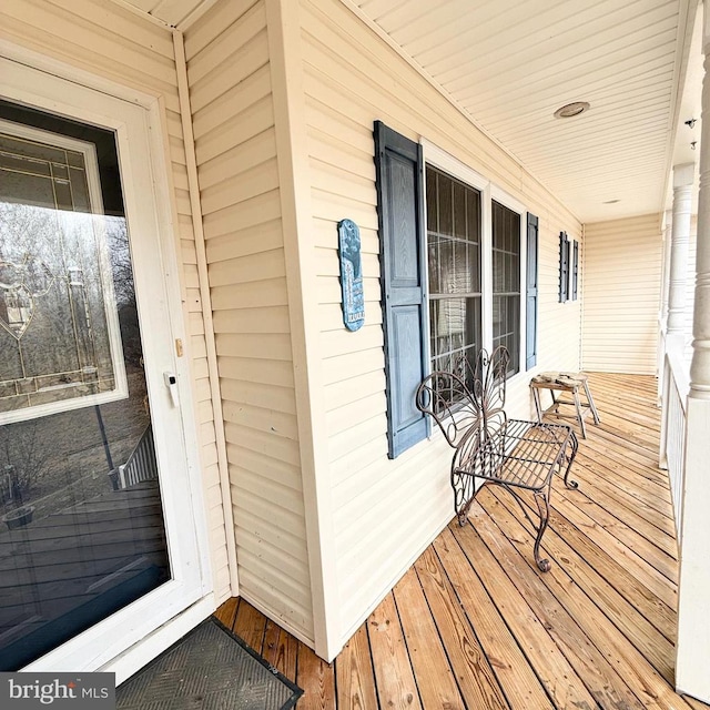 wooden terrace with covered porch