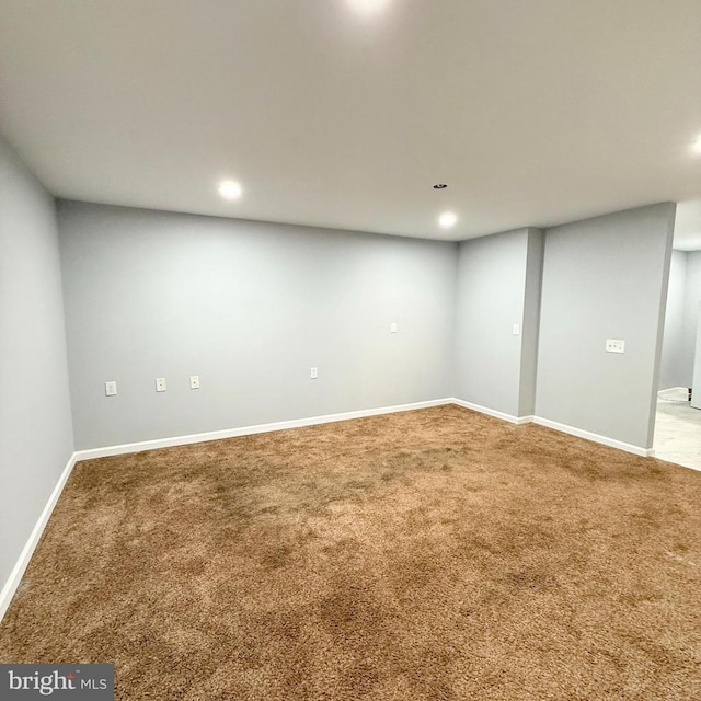 basement with recessed lighting, carpet, and baseboards